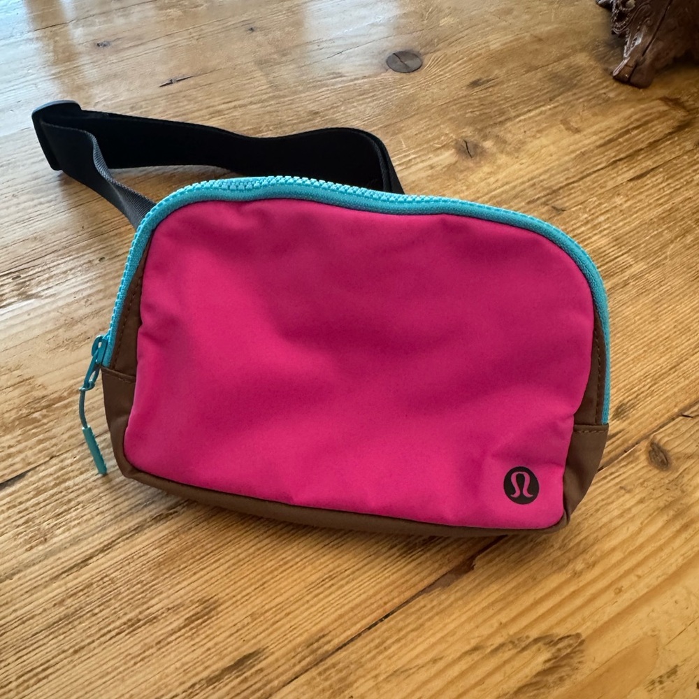 Lululemon Pink Crossbody Bag with Teal Zipper